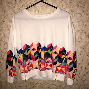 white geometric long sleeve top